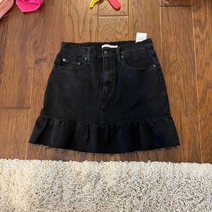 Black denim skirt